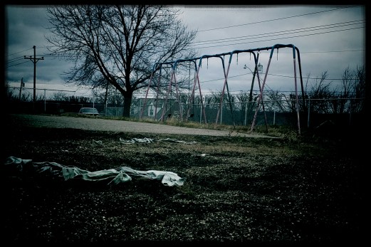 A decaying elementary school playground set for demolition