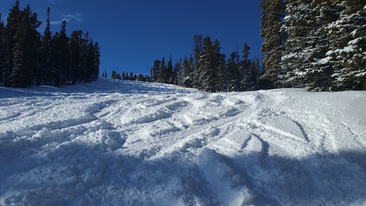 Looking up a ski run named Windmill on a beautiful day at Eldora Mountain Resort.
