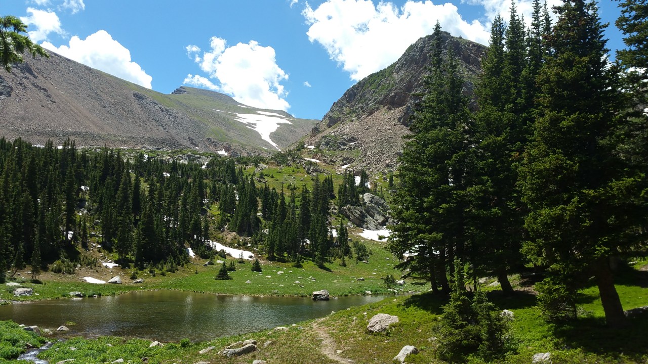 A seasonal high alpine pond just east of the Continental Divide in the James Peak Wilderness of Colorado